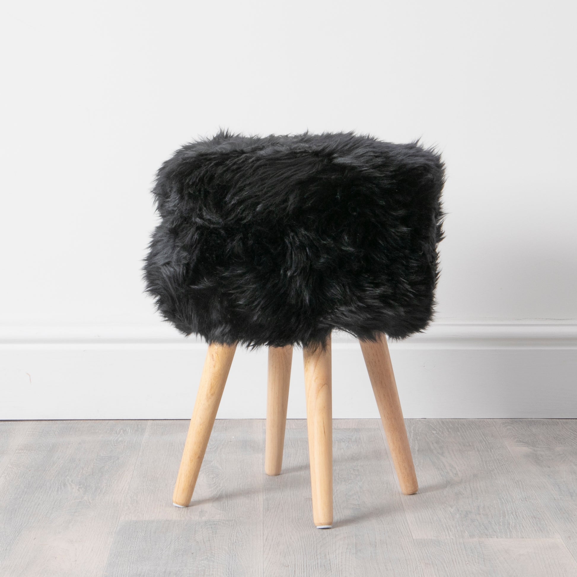 Black Genuine Sheepskin Wood Stool - Light Wood Legs - CasaFenix